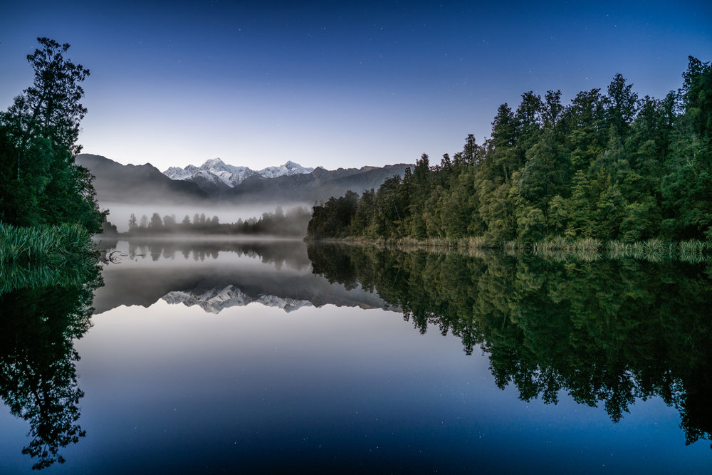 Lake Matheson under the stars - 25mm @ F2, multiple exposure blend